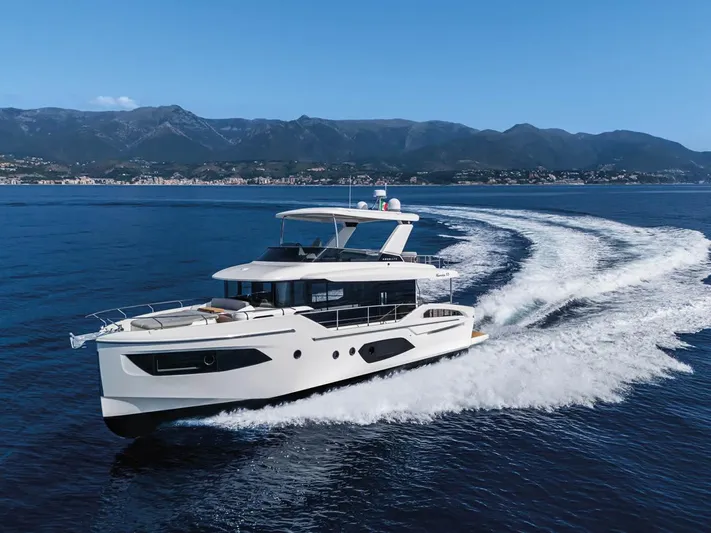  Yacht Photos Pics Luxury Absolute Navetta 53 yacht cruising on open sea, 2026 model.