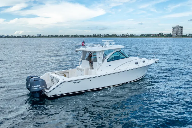 "seven C's" Yacht Photos Pics 2011 Pursuit OS 345 Offshore boat cruising on open water with Yamaha engines.