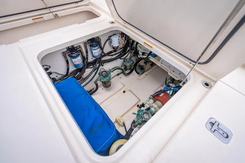 "seven C's" Yacht Photos Pics 2011 Pursuit OS 345 Offshore engine compartment with Yamaha filters and wiring.