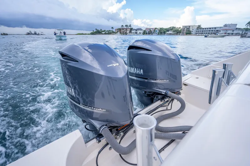 "seven C's" Yacht Photos Pics Twin Yamaha outboard engines on a 2011 Pursuit OS 345 Offshore boat cruising in coastal waters.