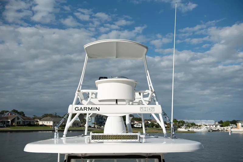  Yacht Photos Pics 2020 Robalo R302 CC boat with Garmin radar on a sunny day.