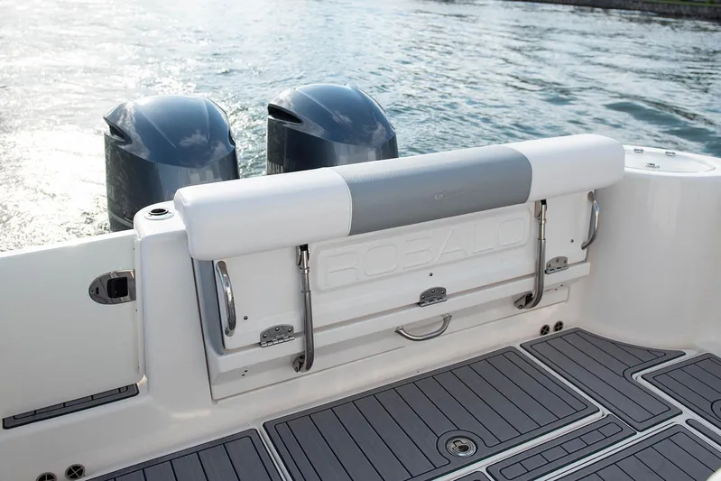  Yacht Photos Pics 2020 Robalo R302 CC boat with dual outboard motors on water.