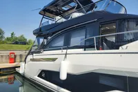 2023 Cranchi F 52 yacht docked, showcasing sleek design and modern features.