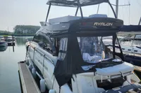 2023 Cranchi F 52 yacht docked at marina, featuring sleek design and modern amenities.