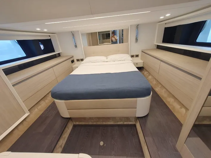 Avalon Yacht Photos Pics Luxurious 2023 Cranchi F 52 yacht bedroom with modern design and elegant furnishings.