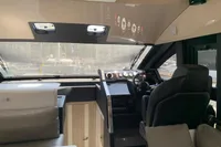 Interior of 2023 Cranchi F 52 yacht cockpit with modern controls and seating.