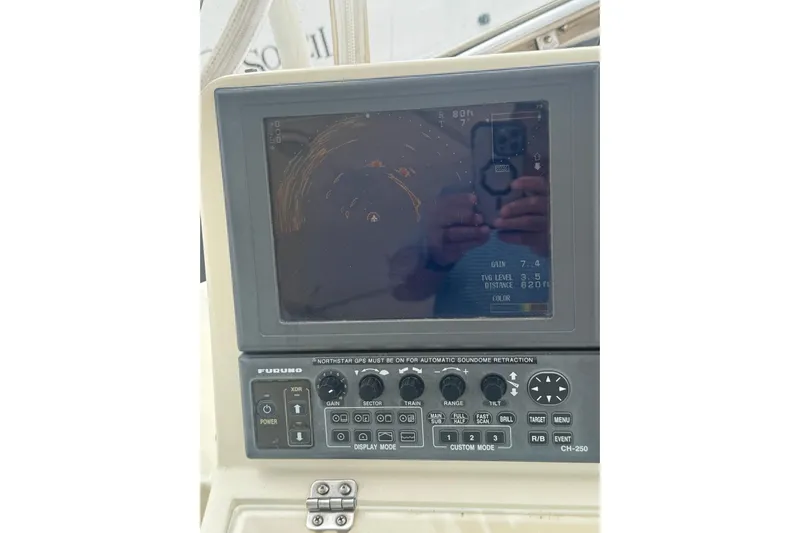The Donut Hull Yacht Photos Pics Furuno radar display on 2002 Mikelson 50 Flybridge yacht, showing navigation data.
