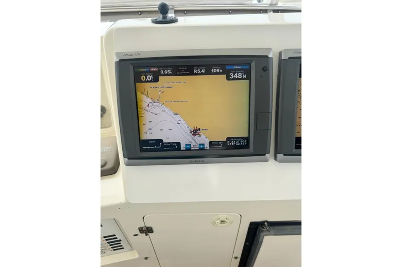 The Donut Hull Yacht Photos Pics Garmin GPS display on 2002 Mikelson 50 Flybridge yacht, showing navigation map.