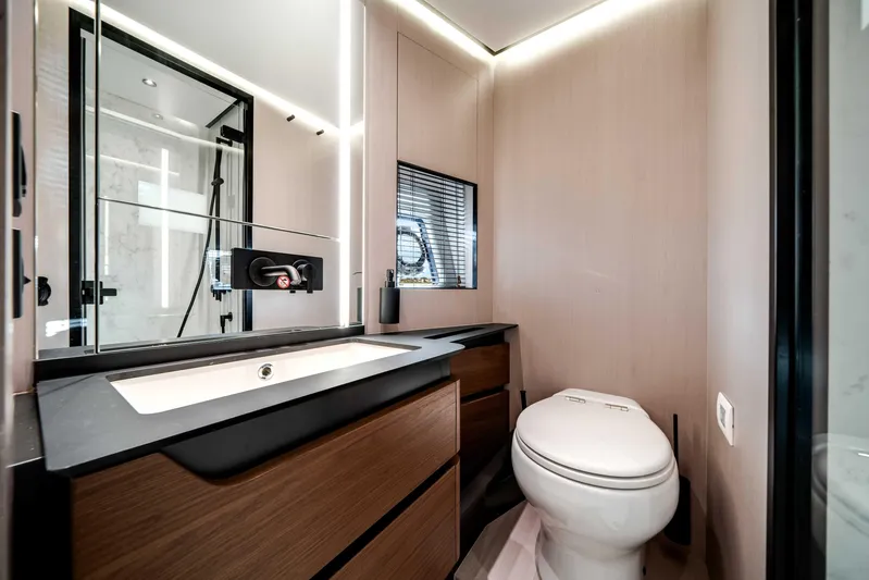 Yacht Photos Pics Luxurious bathroom in 2025 Azimut S8 yacht with modern fixtures and sleek design.