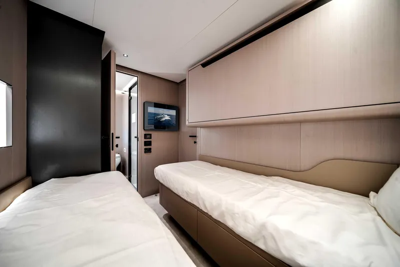  Yacht Photos Pics Luxurious 2025 Azimut S8 yacht cabin with twin beds and modern decor.