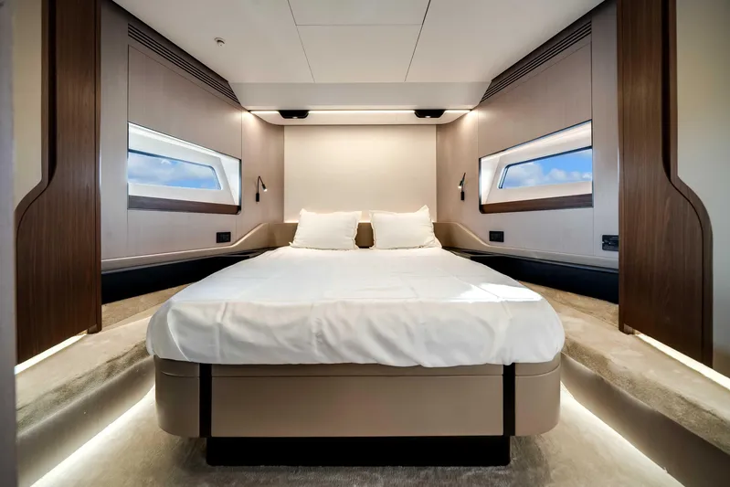  Yacht Photos Pics Luxurious bedroom interior of 2025 Azimut S8 yacht, featuring modern design and elegant lighting.