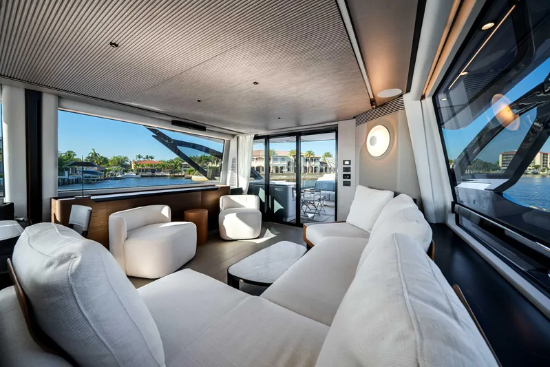  Yacht Photos Pics Luxurious interior of 2025 Azimut S8 yacht with modern seating and panoramic windows.