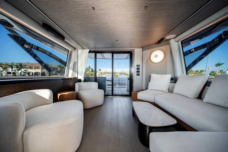  Yacht Photos Pics Luxurious interior of 2025 Azimut S8 yacht with modern seating and panoramic windows.
