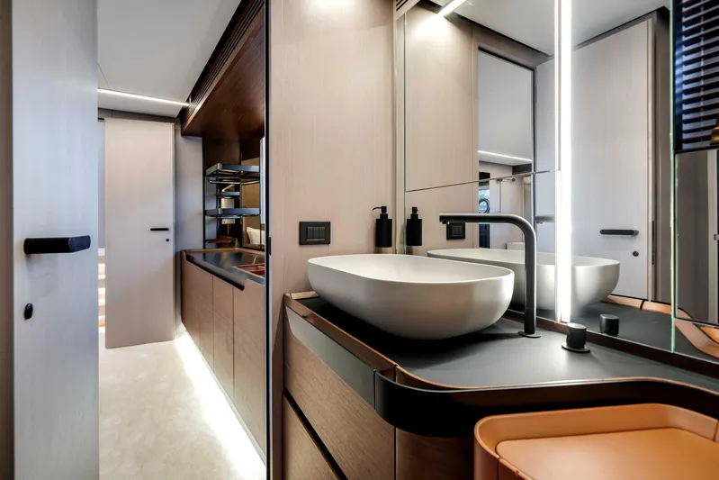  Yacht Photos Pics Luxurious bathroom interior of 2025 Azimut S8 yacht with modern fixtures and elegant design.