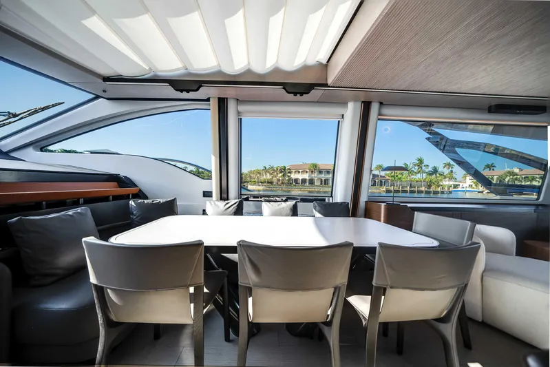  Yacht Photos Pics Luxurious interior of 2025 Azimut S8 yacht with elegant dining area and scenic views.