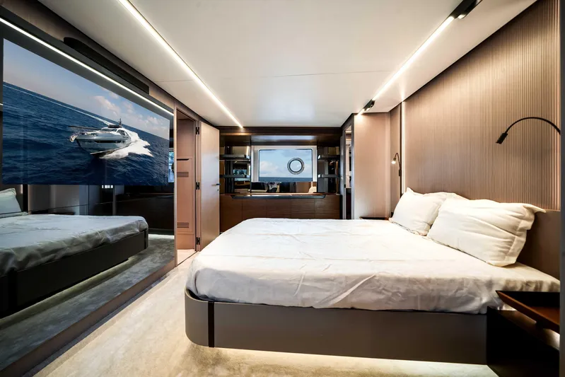  Yacht Photos Pics Luxurious bedroom interior of 2025 Azimut S8 yacht with modern design and elegant furnishings.