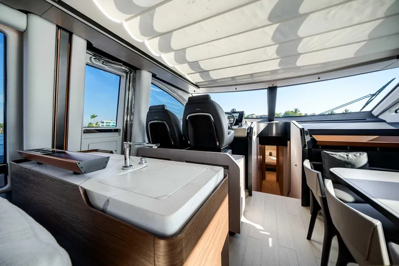  Yacht Photos Pics Luxurious interior of 2025 Azimut S8 yacht with modern seating and sleek design.