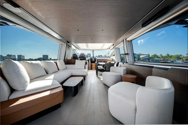  Yacht Photos Pics Luxurious interior of 2025 Azimut S8 yacht with modern seating and panoramic windows.