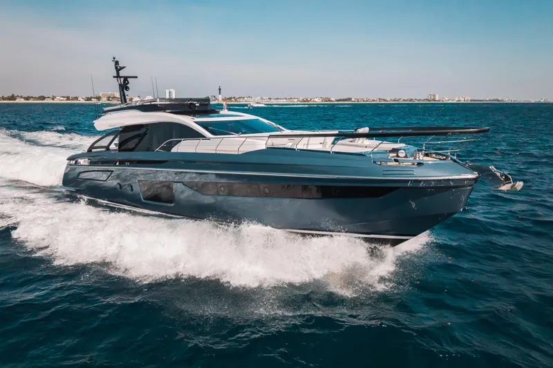  Yacht Photos Pics 2025 Azimut S8 yacht cruising on open sea under clear blue sky.