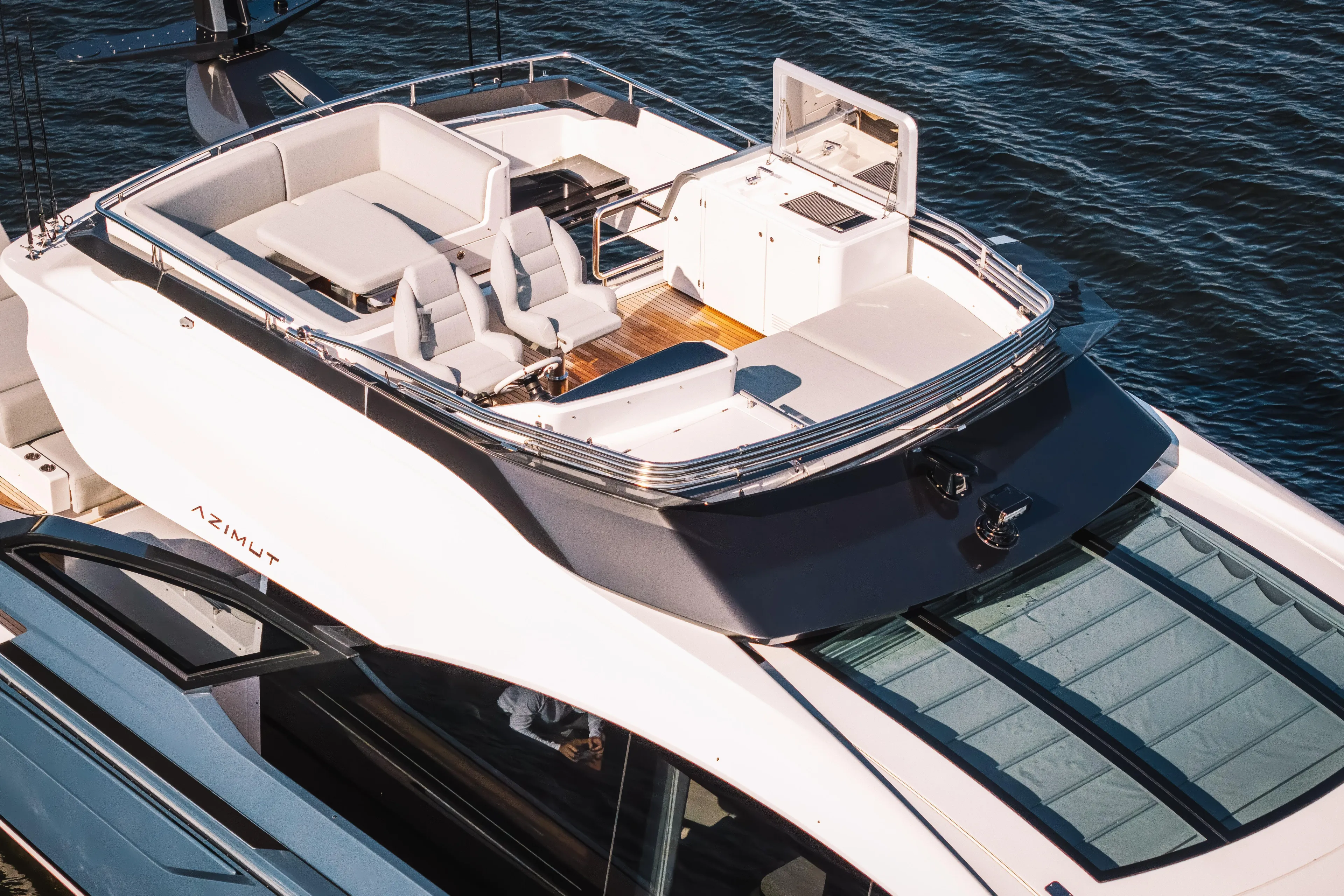  Yacht Photos Pics 2025 Azimut S8 yacht with sleek design and luxurious upper deck seating.