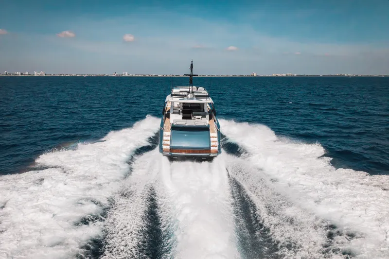  Yacht Photos Pics 2025 Azimut S8 yacht cruising on open sea, leaving a wake behind.