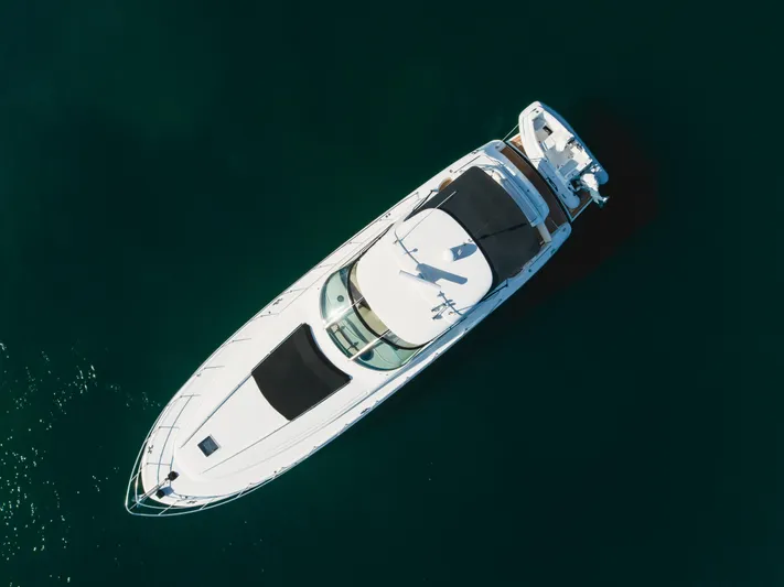 Ranger Yacht Photos Pics Aerial view of 2000 Sea Ray 540 Sundancer yacht on clear water.