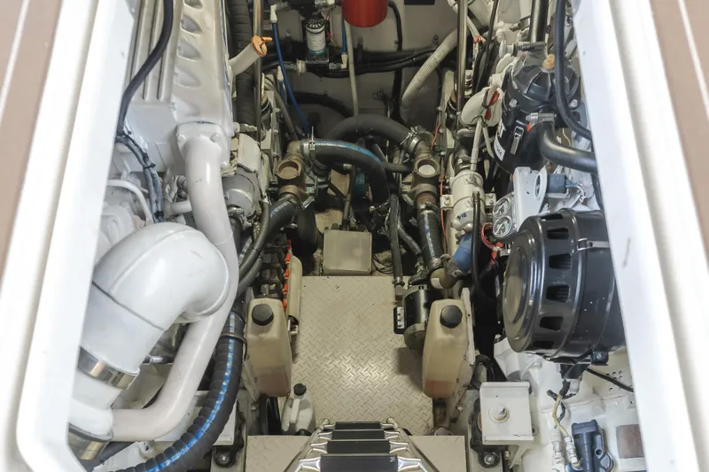 Ranger Yacht Photos Pics Engine room of 2000 Sea Ray 540 Sundancer, showcasing mechanical components and systems.