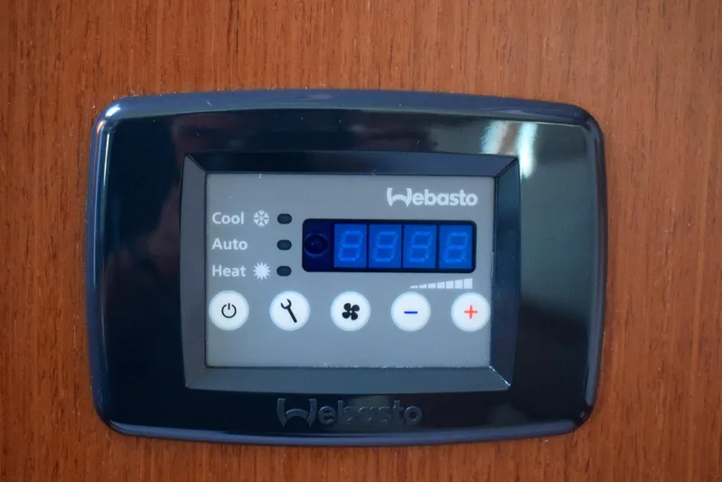  Yacht Photos Pics Webasto control panel on 2015 Beneteau Oceanis 48 yacht, displaying temperature settings.