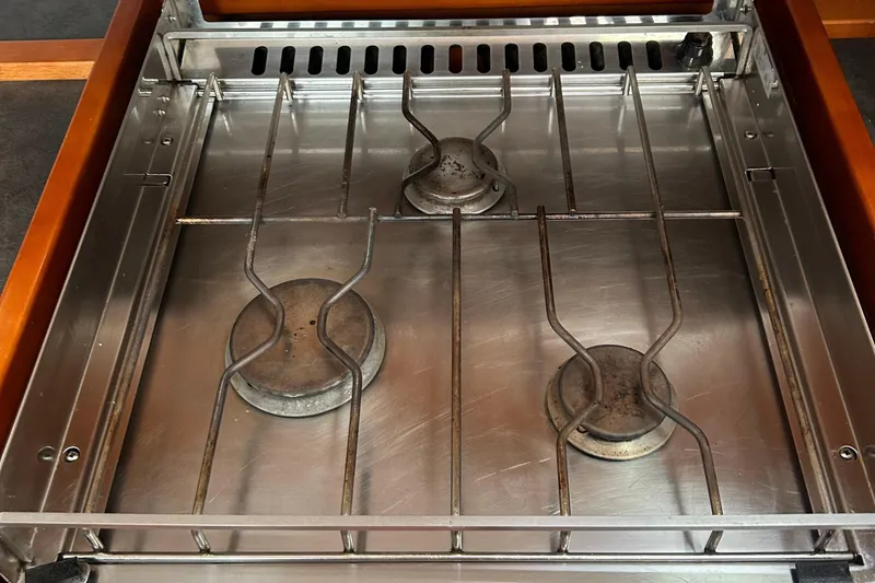  Yacht Photos Pics Stainless steel stove with three burners on a 2015 Beneteau Oceanis 48 yacht.