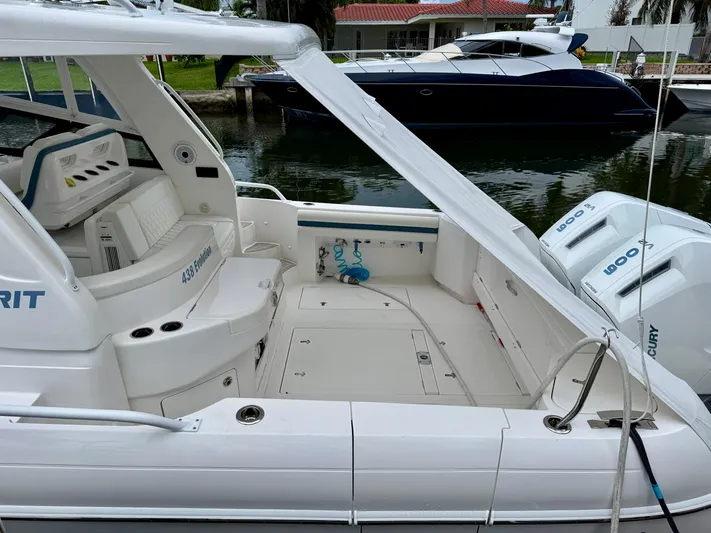  Yacht Photos Pics 2023 Intrepid 438 Evolution boat with spacious deck and dual Mercury engines.