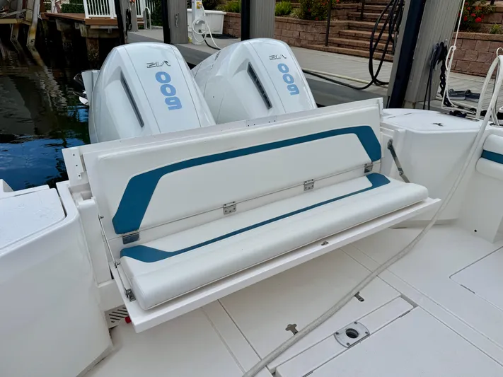  Yacht Photos Pics 2023 Intrepid 438 Evolution boat with foldable seating and dual outboard engines.