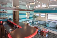 Luxurious interior of 1986 Motor Yacht 38m Nicolini with modern bar and seating area.