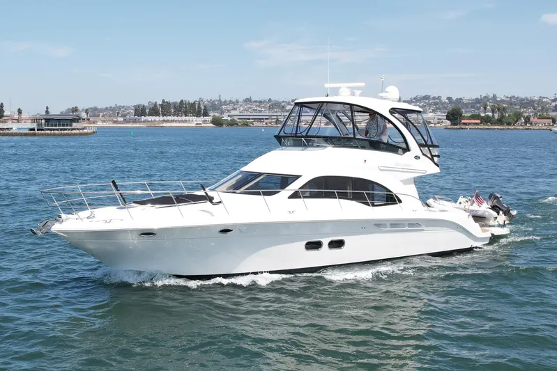 One Shot Yacht Photos Pics 2007 Sea Ray 52 Sedan Bridge yacht cruising on a sunny day.