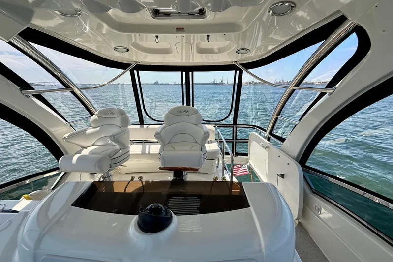 One Shot Yacht Photos Pics Luxurious 2007 Sea Ray 52 Sedan Bridge interior with panoramic ocean view.