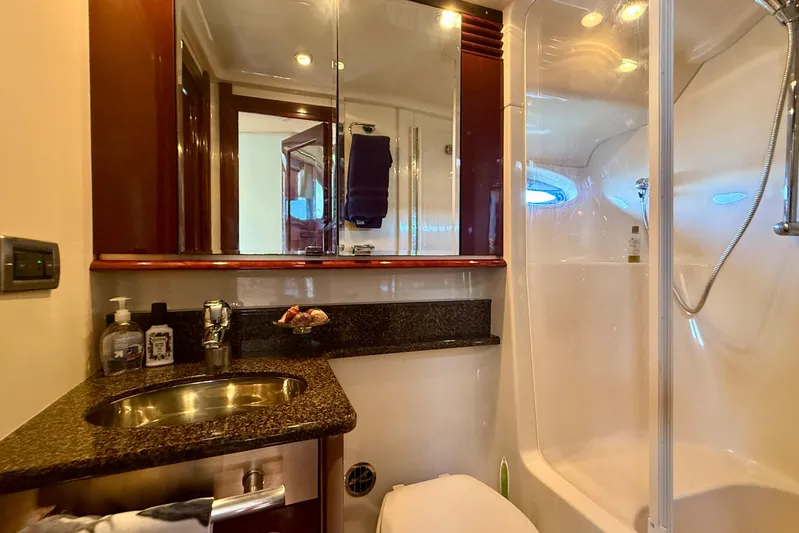 One Shot Yacht Photos Pics Luxurious bathroom in 2007 Sea Ray 52 Sedan Bridge yacht with modern fixtures.