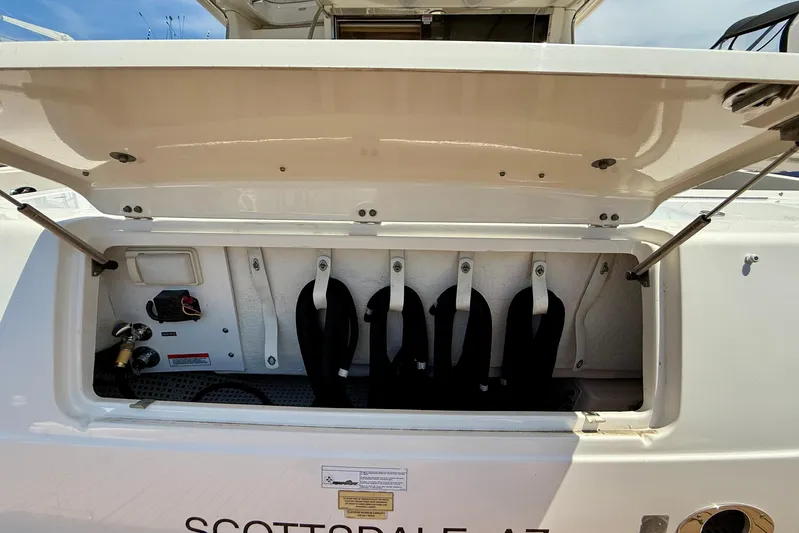 One Shot Yacht Photos Pics Open storage compartment on a 2007 Sea Ray 52 Sedan Bridge yacht.
