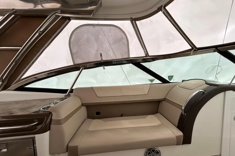Sand Piper Yacht Photos Pics 2017 Formula 350 Crossover Bowrider interior with beige seating and sleek design.