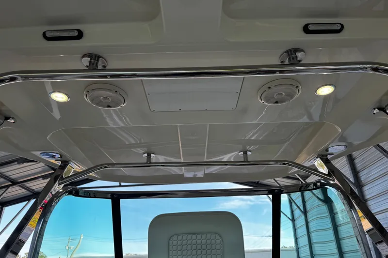  Yacht Photos Pics 2019 Chris-Craft Catalina 26 boat interior with speakers and lights on the ceiling.