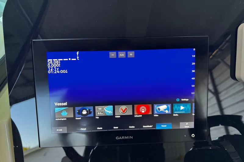  Yacht Photos Pics Garmin display on 2019 Chris-Craft Catalina 26 showing vessel data and navigation options.