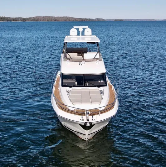 Sandybay Yacht Photos Pics Prestige 520 Fly 2022 yacht on open water, showcasing sleek design and luxury features.