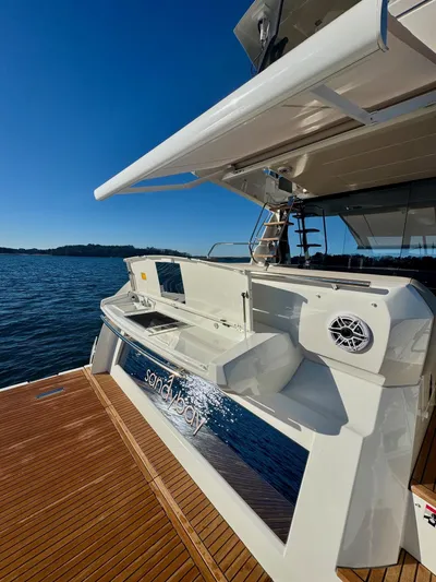 Sandybay Yacht Photos Pics Prestige 520 Fly 2022 yacht with spacious deck and modern design on calm waters.