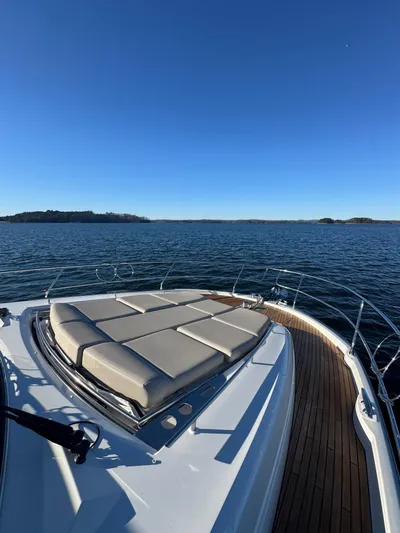 Sandybay Yacht Photos Pics Prestige 520 Fly 2022 yacht with sun deck on calm water.