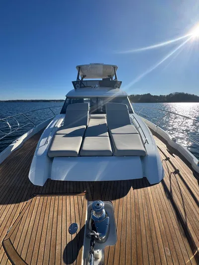 Sandybay Yacht Photos Pics Prestige 520 Fly 2022 yacht on water, sunny day, luxurious deck view.