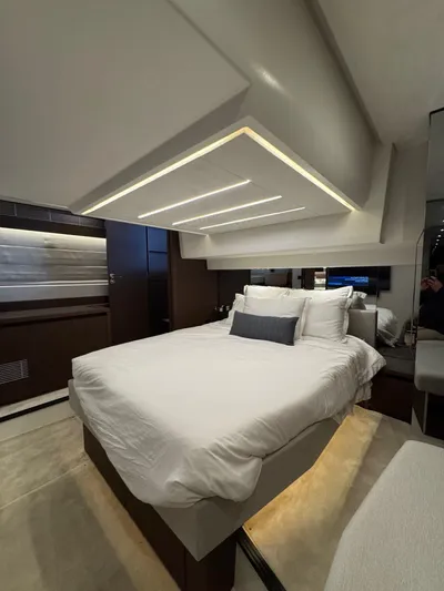 Sandybay Yacht Photos Pics Luxurious bedroom interior of 2022 Prestige 520 Fly yacht with modern design.