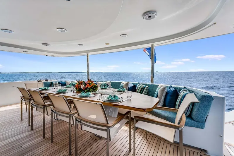 Cupcake Yacht Photos Pics Luxurious dining area on 2001 Westship Skylounge yacht with ocean view.