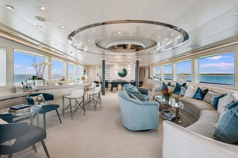 Cupcake Yacht Photos Pics Luxurious 2001 Westship Skylounge interior with elegant seating, panoramic windows, and modern decor.