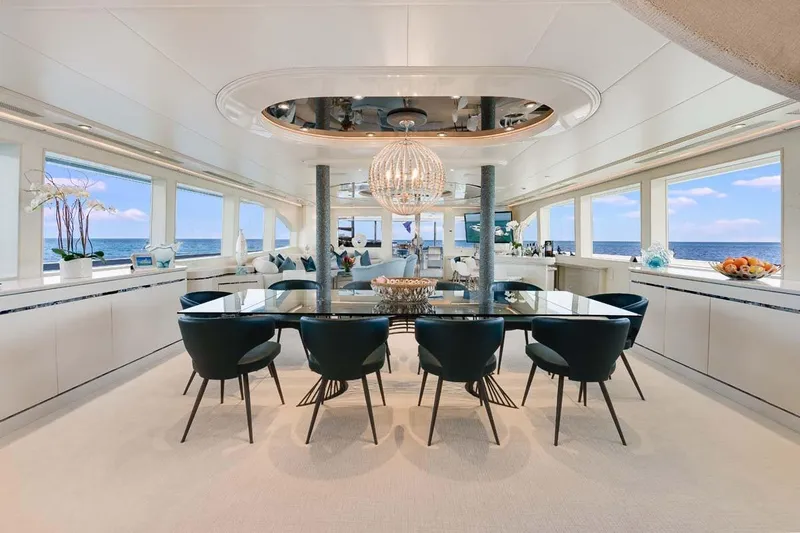 Cupcake Yacht Photos Pics Luxurious 2001 Westship Skylounge interior with elegant dining area and ocean views.