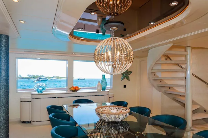 Cupcake Yacht Photos Pics Luxurious 2001 Westship Skylounge interior with elegant dining area and ocean view.