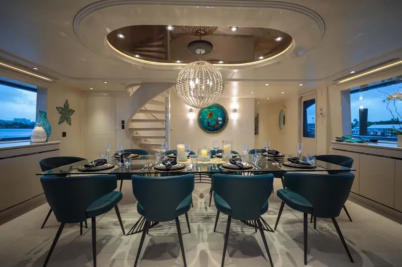 Cupcake Yacht Photos Pics Luxurious dining area on 2001 Westship Skylounge yacht, featuring elegant decor and ambient lighting.