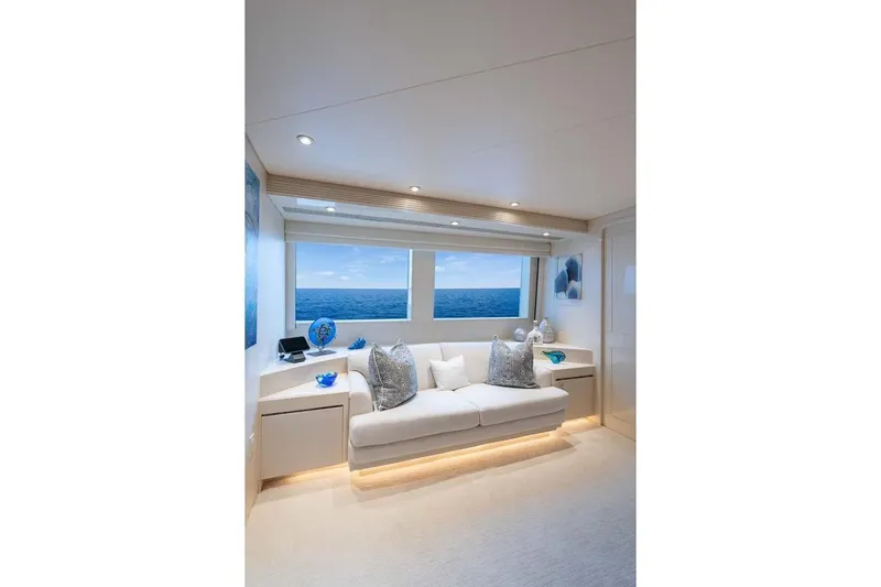 Cupcake Yacht Photos Pics Luxurious 2001 Westship Skylounge interior with ocean view, featuring elegant white sofa and decor.